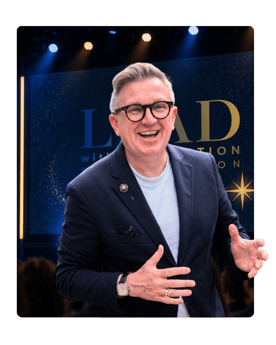 Professional keynote speaker presenting on stage for leadership, imagination, and transformational speaking events